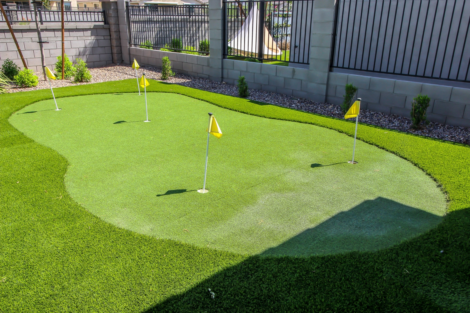 Dog running on artificial grass - Orion Turf and Landscape