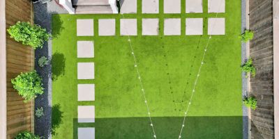 Is a Weed Barrier Installed Under My Artificial Turf Putting Green? - Orion turf & Landscape Blog